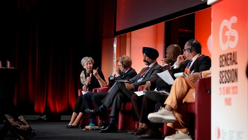 Group of panelists on stage during a conference